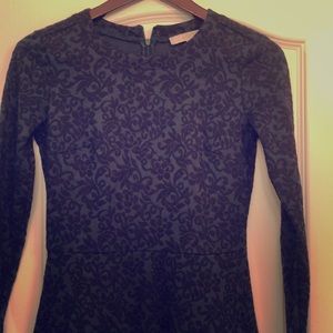 Dark green with black brocade pattern.